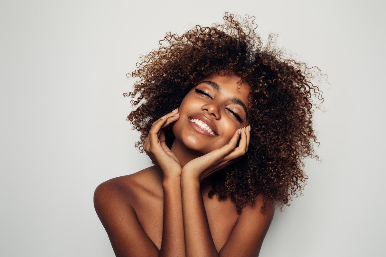A woman with beautiful skin after a Juvederm procedure.
